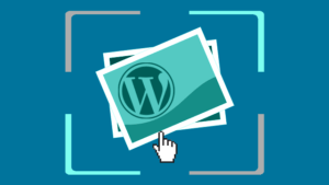 An iillustration of a photo with the WordPress logo and a hand cursor overlaid.