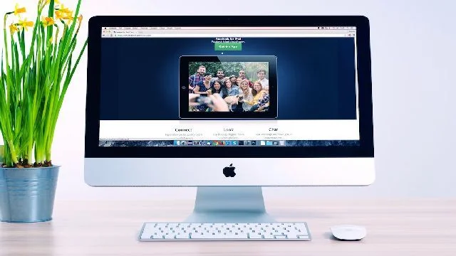 Image of a mac monitor showing a website.