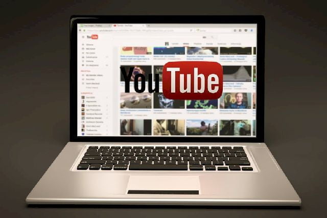 Image of a laptop superimposed with the old YouTube logo.